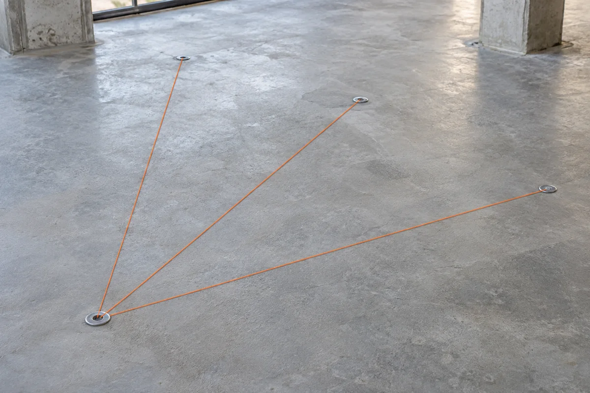 Generated editorial image of three orange layout strings radiating from one floor control marker